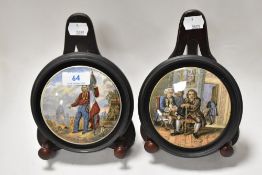 Two Prattware paste pot lids in mounts, including Dr Johnson.