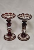 Two Victorian Table lustres having painted red ground and etched scenes with stag and deer to one