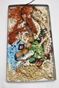 A mixed lot of vintage beaded necklaces.