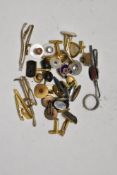 A selection of mens yellow metal cufflinks and a trout design tie pin