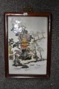 An Early 20th century Chinese ceramic table screen hand decorated in Polychrome, with foliage,