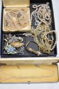 A selection of modern costume jewellery including simulated pearls, yellow metal necklaces and