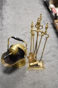 A Victorian design brass companion stand and a similar coal helmet and shovel