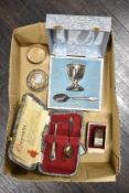 A small selection of white metal wares including two Hm silver napkin rings and silver plated egg