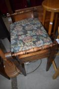 A Victorian mahogany piano stool