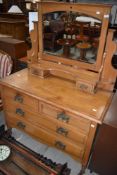 A Victorian satinwood dressing table