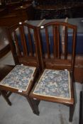 A pair of Edwardian mahogany bedroom chairs