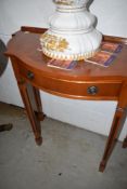 A reproduction Regency yew wood side table