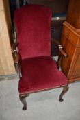 A Queen Anne style mahogany frame high back armchair having burgundy dralon upholstery
