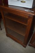 A modern oak display or entertainment cabinets