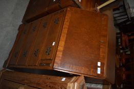 A reproduction burr walnut bureau