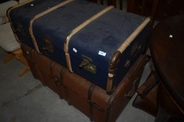 Two vintage luggage trunks