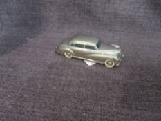 A Prameta clockwork and diecast Mercedes-Benz 300 Car in silver with white tyres