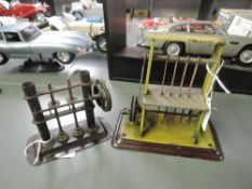 An early Marklin tin plate live steam vertical Four Blade Saw along with a early Steam Hammer