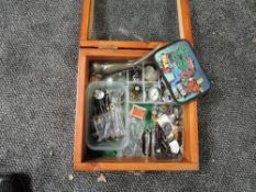 A small wooden and glazed display case containing Lead Figures and Accessories, Acme Whistle,
