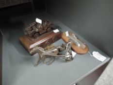 A WW2 era chromed model of a Submarine on wooden plinth along with a novelty Lighter, bronze