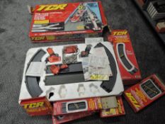 A collection of Ideal TCR Slotless Racing System including Super 4 Twin Cicuit missing al 4 cars,