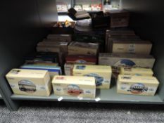 A shelf of 1990's Corgi diecast Buses including vintage Bus Sets and Individual Buses, (30), all
