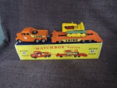 A Matchbox Lesney King Size diecast, K-8 Tractor and Transporter having Laing decal, in orange