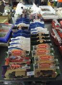A collection of modern diecasts including Lledo Route 66, RAC, Coca Cola etc, all boxed, 34 in