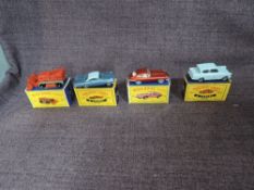 Four Matchbox Lesney diecasts, No 7 Ford Anglia, No 32 Jaguar E Type, No 57 Chevrolet Impala and