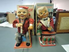 Two 1960's TN Japanese tin plate and battery operated Rosko Toys, 078 McGregor and 0350 Bartender,