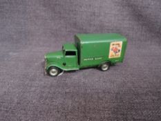 A Triang Minic clockwork and tin plate Southern Railway Van having green body and cab
