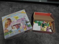 A Hasbro My Little Pony Show Stable in original box along with Ponies and Accessories in separate