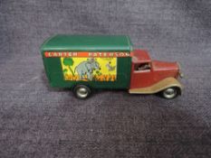 A Triang Minic clockwork and tin plate Carter Paterson Van having green body and maroon cab