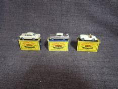 Three Matchbox Moko Lesney diecasts, No 19 MG A Sport Car, No 22 Vauxhall Cresta in pink and No 27