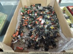A box of mixed vintage lead and plastic figures and on horseback including early and modern