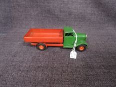 A Triang Minic clockwork and tin plate Wagon having red body and green cab with key