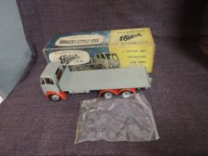 A 1950's Shackleton Toy clockwork Foden FG in grey with red guards, in original box with key and