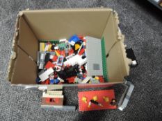 A small box of vintage Lego including Figures and Parts and Motor etc