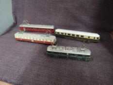 A Marklin HO scale SBB FFS Locomotive along with a Fleichmann HO scale Munchen Locomotive and