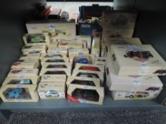 A shelf of approx forty modern Corgi Classic diecasts including two vehicle sets, Cars, Vans, Wagons