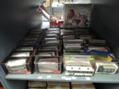 A shelf of EFE, Corgi and Day Gone diecast Buses and Advertising Vans, (30) all boxed