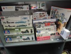 A collection of Twenty Three mixed scale plastic Military related Kits including Italeri 1:9 US WWII