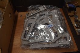 A bag full of ladies fashion watches new in packaging.