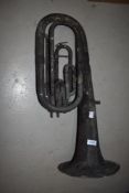 An extremely distressed Horn. This wind instrument has obviously seen better days!