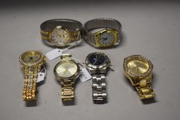 Five mens watches with gem or silver accents.
