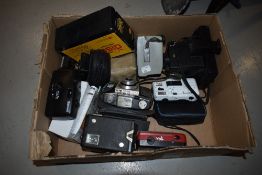 A selection of vintage photography cameras including Kodak, Halina, Polaroid, and Brownie