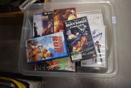 A collection of VHS video tapes including The Mask, Chicken Run, Batman Forever, About a Boy, Four