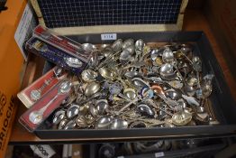 A collection of display teaspoons.