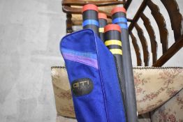 A Matchman 4 rod carry case containing a selection of telescopic rod rests and a landing net along