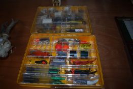 Two boxes of lures hooks and weights