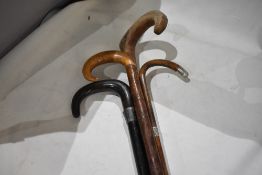 Four canes /walking sticks