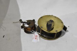 2 Vintage unmarked Brass fishing reels one being 3, 1/2 inch and one 1, 3/4 inch in diameter
