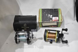 An ABU Ambassadeur 6000c Multiplier reel in original leather case and an Abu Garcia Ambassadeur