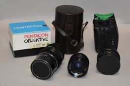 Three lenses. A Pentacon 2,8/135mm, a Pentagon 1:3,5 f=35mm and a Pentacon 2,8/29